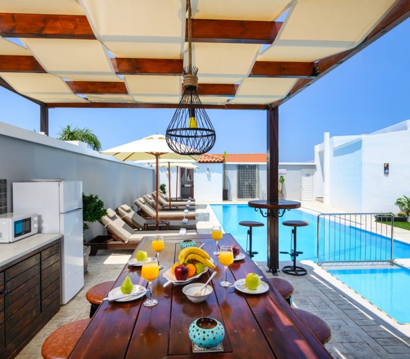 Outdoor dining area and pool